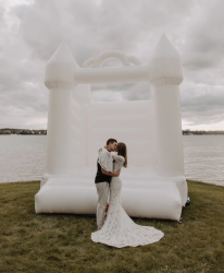 white wedding inflatable bounce house image1 1746723968 Victoria's White Castle
